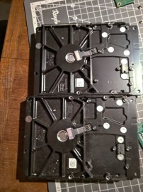 The HDDs in comparison, look at all that dust! 