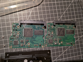 The meaty side of the PCBs in comparison. Different chips but all we care about is the revision 